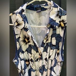 Ann Taylor factory romper! Floral design, waist band, capri length pant.